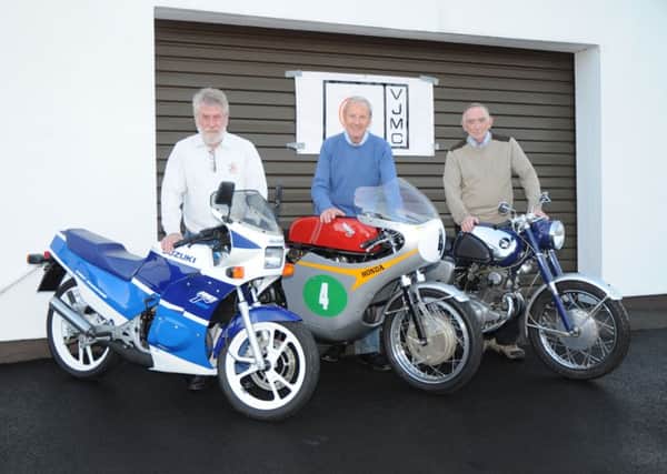 Billy Bamber © promoter of the VJMCC Motorcycle with Ian Waddell and Brendan McMullan with some of the motorcycle that will be on display at the show on the 3rd 4th October in the Ballymena Leisure centre, on display will racing bikes and memorabilia of the late Ralph Bryans the only Irish World GP Championship winner.GB4001ta