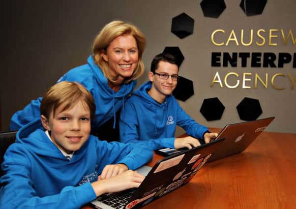 Selected to train MEP's on Coding Skills are Reuben Ackermann from Dalriada School and Sam Stuart from Dominican College with Coleraine Coder DoJo Champion Camilla Long.   01  Clancy Photography Coderdojo