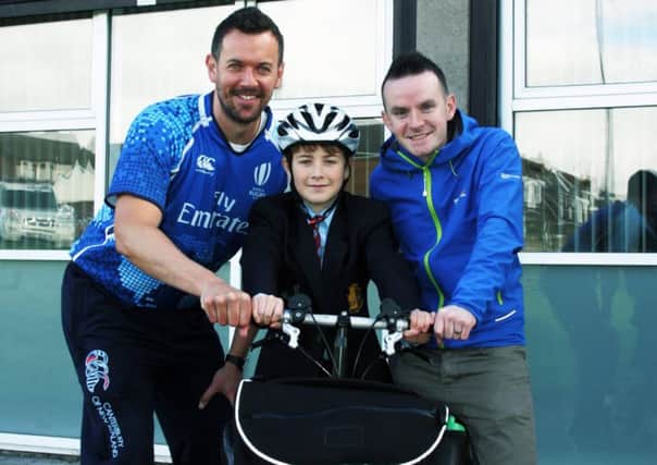 Johnny McCrystal from Sustrans Active Schools with teacher Mark Patton and pupil Charlie McKeown. INCT 39-707-CON