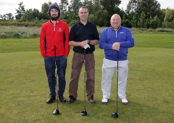 David Stirling junior, David Stirling senior and David McAleese taking part in the recent Harry Dunlop Stroke at Galgorm Castle Golf Club. INBT37-242AC