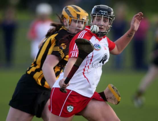 Racquel McCarry from Loughgiel in possesion in the County Antrim Senior Camogi final played in Armoy on Saturday evening. PICTURE STEVEN MCAULEY/MCAULEY MULTIMEIDA