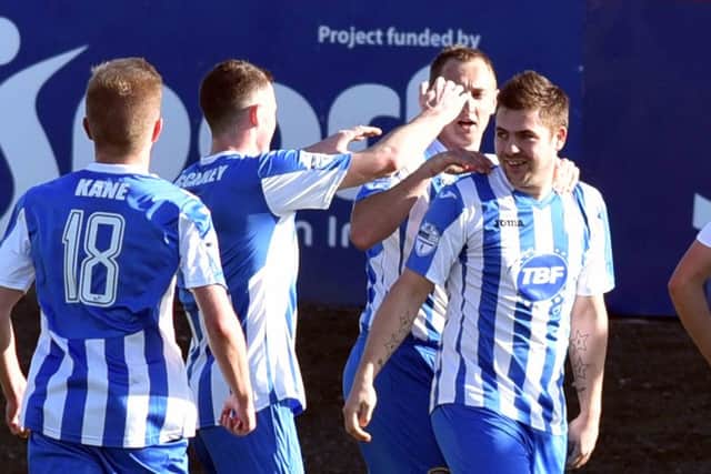 Coleraine'sJames McLaughlin 
celebrates after scoring to make it 1-1
during Saturday's match at Shamrock Park. 
Photo by TONY HENDRON/Presseye.com.