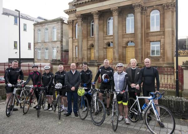 Rev David Latimer, second right, with cyclist who are taking part in the Foyle Run in the 'Pathways to Peace' which is a Peace Building initiative for schools across Northern Ireland. Included are, from left, Jim O Hara, Siobhan McCarron, Eamon Doherty, Niall O Kane, John Halliday, Anthony McKeever George O Hara, Paul Hyndman and David Moore.
