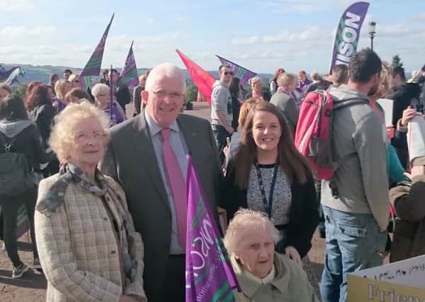Stewart Dickson at the protest against care home closures outside Stormont on September 28. INLT-40-704-con