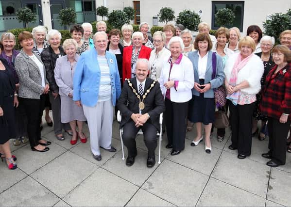 Mayor Thomas Beckett welcomes members of the Lisburn Cancer Research UK committee and collectors to Lisburn civic centre for a reception to recognise and honour their work for the charity. US1538-528cd  Picture: Cliff Donaldson