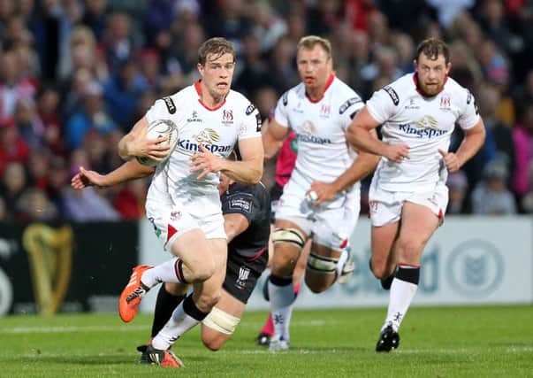 Ulster's 

Andrew Trimble on the attack against Ospreys