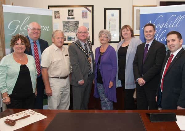 Mid and East Antrim Borough Mayor, Cllr. Billy Ashe, pictured as he hosted a reception for the judges, Ted Zarundy and Lorna McIlroy in his Parlour at The Braid  is hoping that the boroughs famous floral displays will take in award at the Communities in Bloom competition presentations in Canada at the weekend. (Submitted Pic).