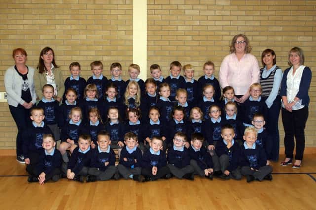 Primary 1 pupils from Fourtowns PS pictured along with Rhonda Holmes, Mrs. K. Rainey (teacher), Amy Evans, Shelly Mulholland and Mrs. C. Stevenson (teacher). INBT