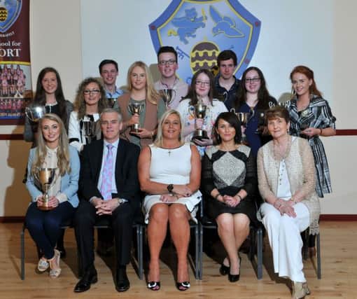 Principal of St Pius X College Magherafelt Ms Jackie Bartley  with Best A2 Level award winning students. Included in the picture are Brian McErlain (Chairman of the Board of Governors), Anglea O'Neill (Guest Speaker and Una O'Kane (Board of Governors).INMM3915-358