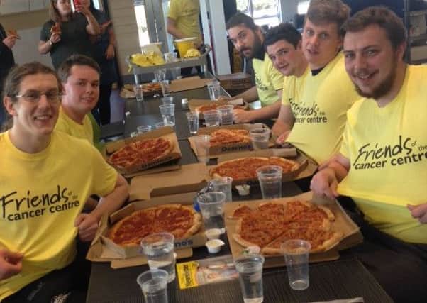 Tuck in boys...getting ready for a pizza fest at the Man vs Food challenge.