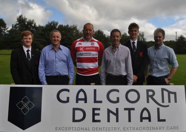 Mr Chris Gocher, Mr Dougie Thom, Mr Alan Crockett, of Galgorm Dental, who have provided sponsorship for Ballymena Academy First XV. Included are coach Mr Andrews and players Joel Gocher, Chris McLeister.