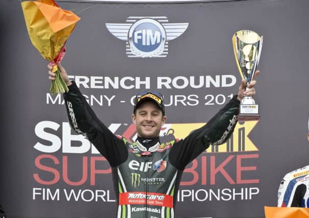 Jonathan Rea tops the podium at Magny-Cours. INLT 41-997-CON