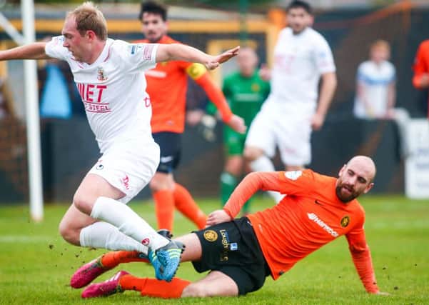 Carrick Rangers' Ryan Kane conceded a penalty during the final moments of the game at Taylor's Avenue after he appeared to fell Portadown's Ross Redman in the box. INLT 41-942-CON Picture: Kevin Scott / Presseye