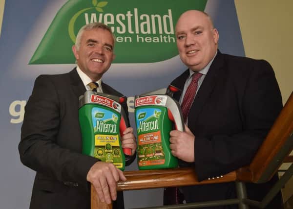 Enterprise, Trade and Investment Minister Jonathan Bell with Robert Lavery of Westland Horticulture following an announcement that the Dungannon firm created 70 new jobs as part of a  £9.6m expansion. 
Photo: Simon Graham/Harrison Photography