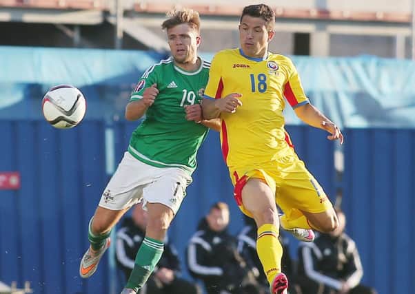 Jamie Ward (left) in action against Romania back in June