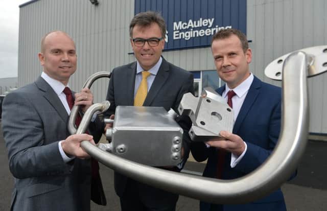 Advanced engineering businesses McAuley Precision and McAuley Fabrication announce a £5m investment supported by Invest Northern Ireland that will create 87 new jobs in Ballymoney by 2019.
Pictured (L - R) during a visit to the companies' premises are Jonathan McAuley, Managing Director of McAuley Precision and McAuley Fabrication, Invest NI Chief Executive Alastair Hamilton and David Condell General Manager.
Photo by Aaron McCracken/Harrisons 07778373486