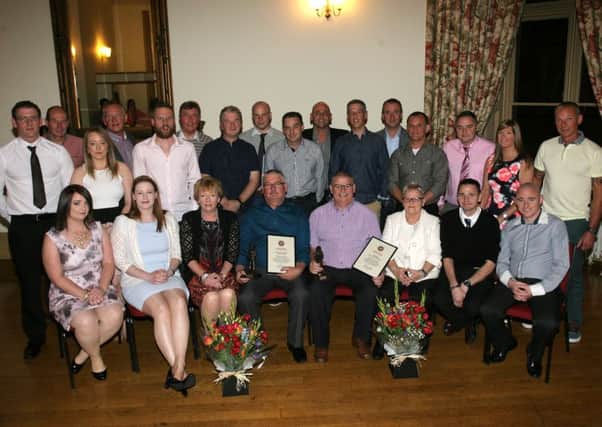 Watch Commander Jarlath Lavery and Fire Fighter John Joseph McMillen, who retired from Lurgan Fire Station after 30 years and 26 years respectively, are pictured with colleagues and guests at a special retirement function in their honour. INLM41-205AM