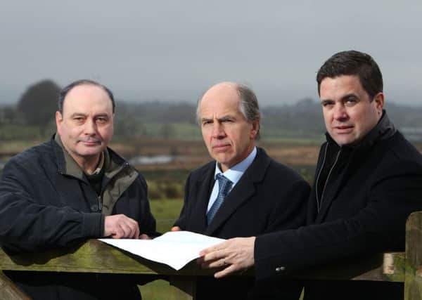 Landowner Gawn Graham with Garry Best, land Agent and Ronan Kilduff, MD Elgin Energy.