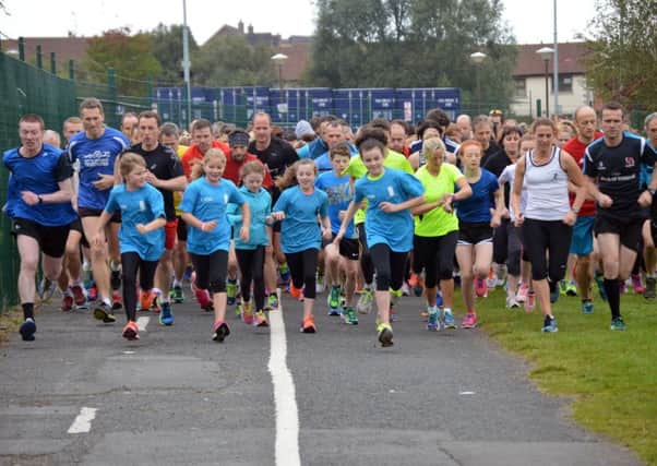 Runners set off at the starting line of Saturday's ParkRun event.