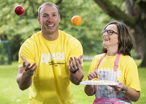 Be like former rugby star Stephen Ferris pictured with Aware Chief Executive, Siobhan Doherty and get involved.