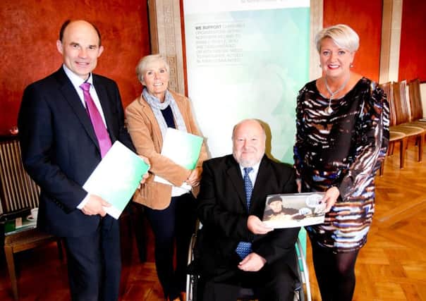 East Antrim MLA Roy Beggs with Maureen Hanvey (Learning to Grow), Stephen Frecknall (Belfast Lough Sailability) and Straid woman, Sandara Kelso-Robb (Lloyds Bank Foundation for Northern Ireland) at the Foundations special anniversary reception at Stormont.  INLT 42-658-CON