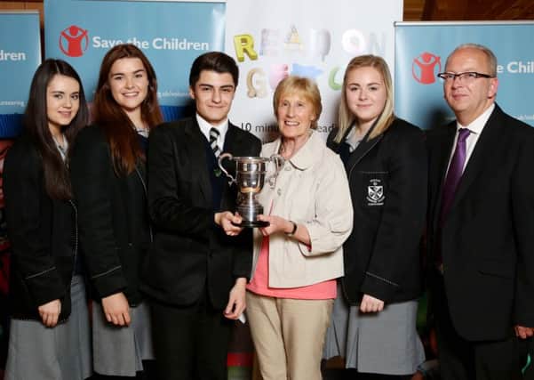 Yvonne Orr is pictured presenting the Rita Rodden award to Dominican U6 pupil Brandon Ali. Also pictured are Clare Doherty, Kai Dillenburger-Keenan, Tara McArthur all Upper sixth pupils with their teacher Mr Kevin Ramsay.