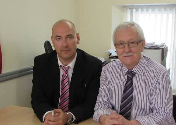 Sinn Fein MLA Oliver McMullan meets Gary Hewitt from the Police Ombudsman's Office.  INLT 42-659-CON
