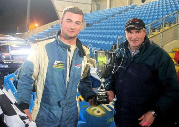 Glenn Bell collects the National Hot Rod Trophy from event sponsor Ross Hyndman.
