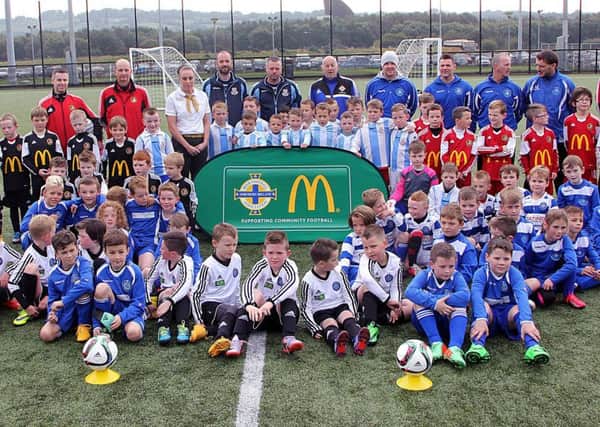 Photographed on Saturday morning at the Showgrounds were these youngsters who took part in the IFA small-sided games programme. Included is sponsor McDonalds representative Tanya Hunter. INBT 41-901H. See page ??? for more details on IFA-backed initiatives taking place in the local area.