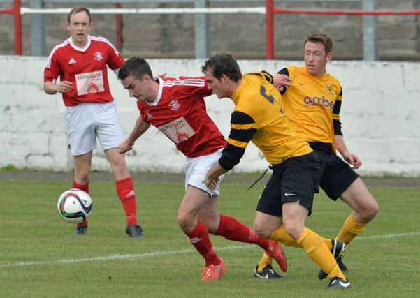 Action from Larne FC and H&W Welders at Inver Park. INLT 41-015-PSB
