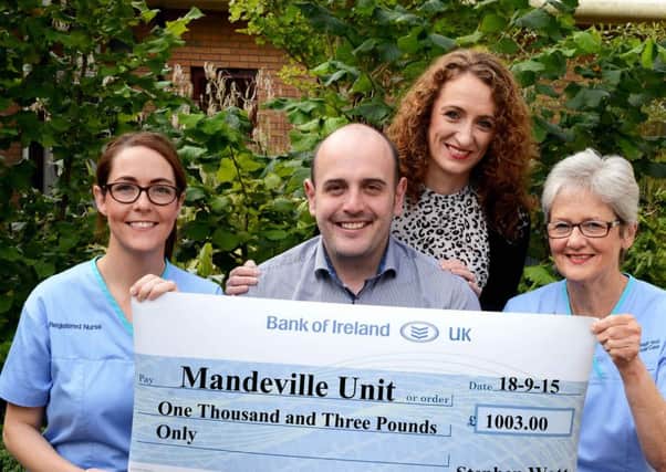 Stephen and his wife Denise pictured with Staff Nurses Libby McElmeel and Margaret Wilson at the Mandeville Unit. INNT 42-814CON