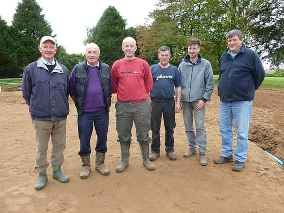 The greens staff, ably assisted by a number of volunteer helpers, carried out the work.