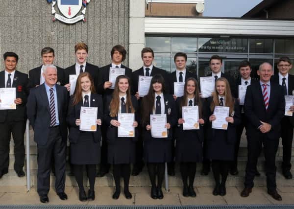 Ballymena Academy students who received PF Martin Achievement Awards are seen here with school principal Mrs Stephen Black and vice principal and vice-principal Mr Ross. INBT 42-107JC