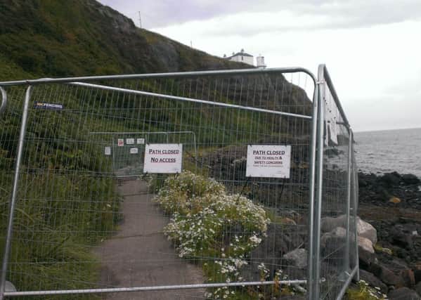 Barriers are to be strengthened at Blackhead Path.  INCT 32-790-CON