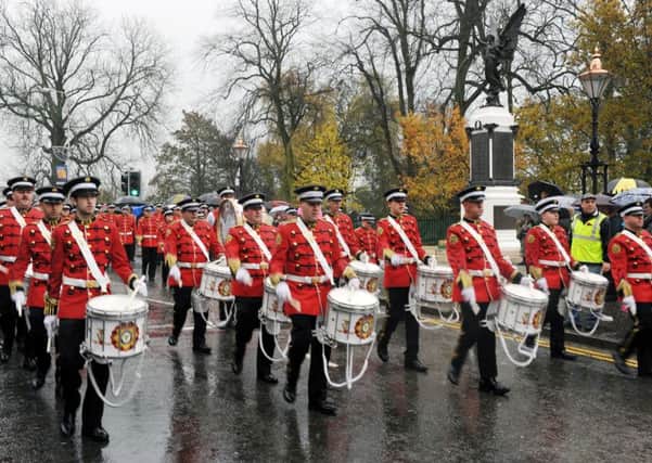 Pride of Knockmore Flute Band pictured arriving at Lisburn War Memorial for a short act of remembrance conducted by the Rev John Pickering.
