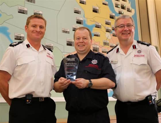 Clive Hamilton with Assistant Chief Fire Officer, Michael Graham (left) and Chief Fire Officer, Dale Ashford (right)