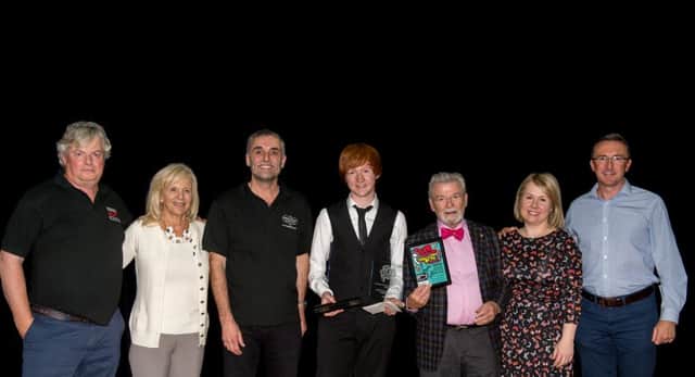 Local musician Ross Houston was the winner at the inaugural 'Big Flute Challenge' 15 and under flute competition which was panelled bythe legendary flautist Sir James Galway and Lady Jeanne Galway.
He received £150.00 and a  handmade solid silver flute head-joint sponsored by Ian McLaughlin Head-jointsPicture submitted.