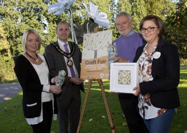 Lord Mayor Councillor Darryn Causby along with Arts and Events Officer Leah Duncan and craft exhibitors Trevor Woods (Mount Ida Pottery) and Jane Mathers (Handcrafted by Jane) get ready for the Autumn Arts Craft Fair.