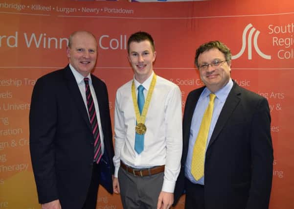 (L-R): Brian Doran-Chief Executive at Southern Regional College, Gary Doyle- WorldSkills Gold Medal Winner, Dr. Stephen Farry - Minister for Employment and Learning.