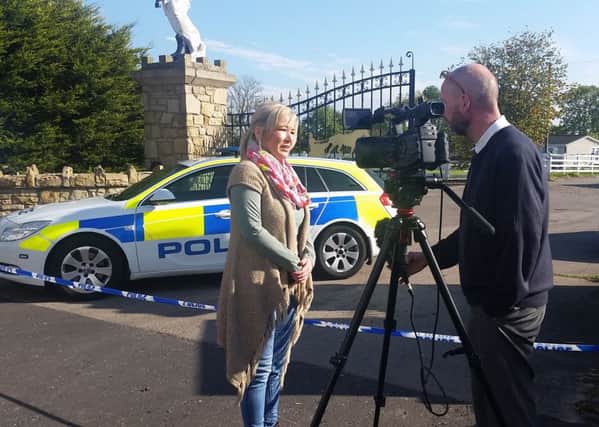 Mid Ulster MLA Michelle O'Neill speaks to the media at the scene on the Moor Road, Coalisland, where a man's body was discovered
