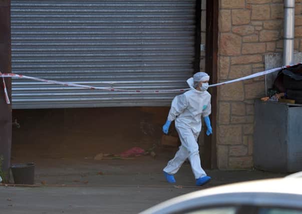 Police Forensics investigate the circumstances surrounding the death of the 32-year-old. Colm Lenaghan/Pacemaker Press
