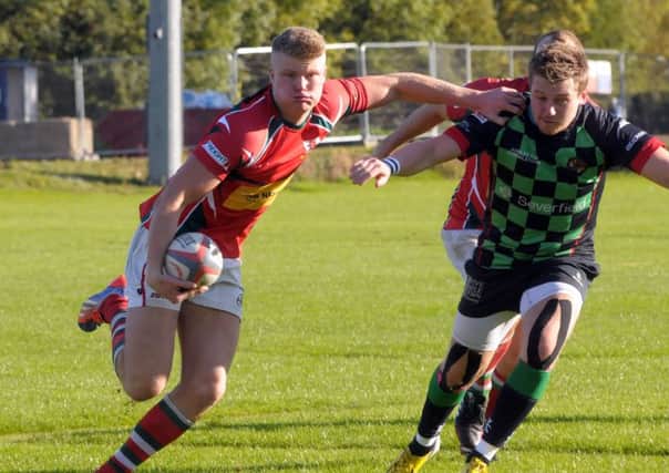 Larne's Jordan Burns scored his side's only try in the 20-13 Junior Cup defeat to Clogher Valley. INLT 42-207-AM