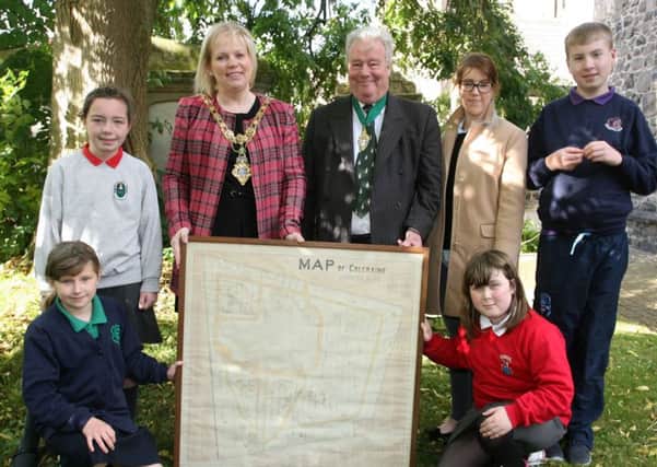 Councillor Michelle Knight-McQuillan, Coleraine Mayor, Roger Chadwick, Deputy Governor of The Hon. The Irish Society, and Sarah Carson, Coleraine Museum, pictured with pupils from DH Christie, St. Malachy's and Ballysally Primary School and Sandelford School during the launch of the St. Patrick's Graveyard Trail which has been funded by The Hon. The Irish Society. INCR44-303PL