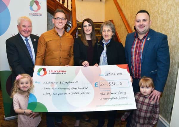 A cheque for £24,356.16 was presented to Leukaemia and Lymphoma NI were Gary Gilmore and Eric Gilmore who raised the money with several functions. Included is Bill Pollock, Clare Atchison and Hazel Black. Also Ellie and Erica. INBT 44-826H
