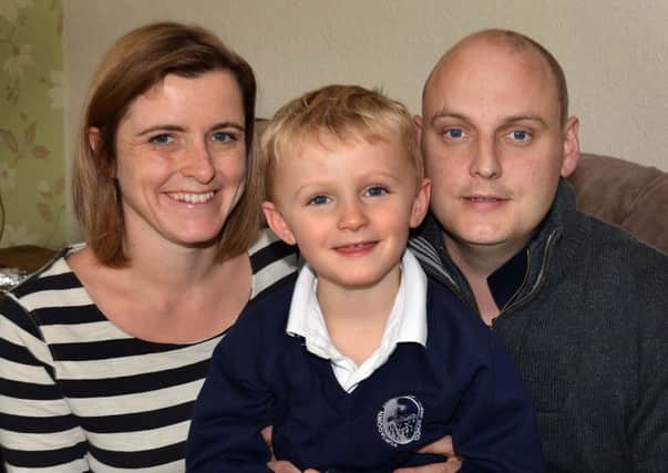 David Smith with his fiancee, Katy Harris and their son Danny (3). INPT43-207.