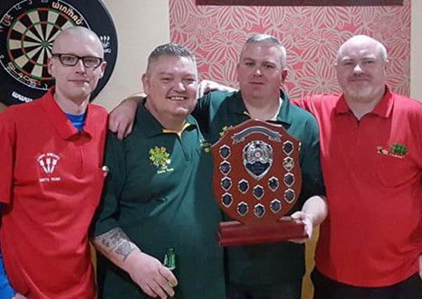 The winning INF A team of Dan Cahoon, Dave McCusker, Terry Morrow and Paul White