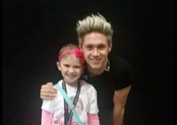 Molly meets her idol, One Direction's Niall Horan.