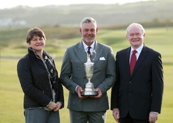Acting First Minister and Finance Minister Arlene Foster and deputy First Minister Martin McGuinness pictured with Darren Clarke, at the official announcement that The Open Championship is to be held in Royal Portrush in 2019, and twice more before 2040. Picture by Kelvin Boyes/Press Eye.