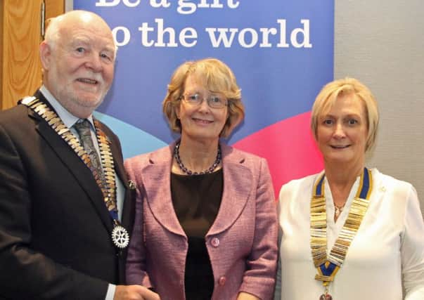 Declan Tyner, Rotary District Governor and his wife Pat with Brenda Houston (right), president of Carrickfergus Rotary Club. INCT-42-758-CON