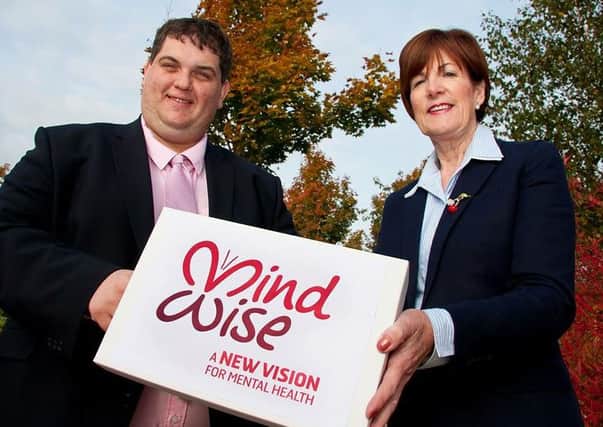 Councillors David Arthurs and Noreen McClelland at the launch of the Council's association with MindWise. INNT 43-827CON